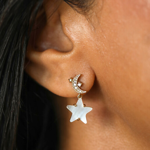 model shot of mismatched earrings