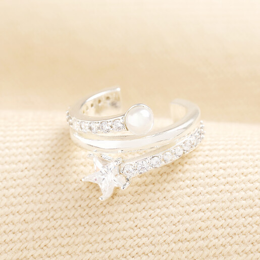Silver wrap ear cuff adorned with clear crystals, a pearl, and a star crystal.
