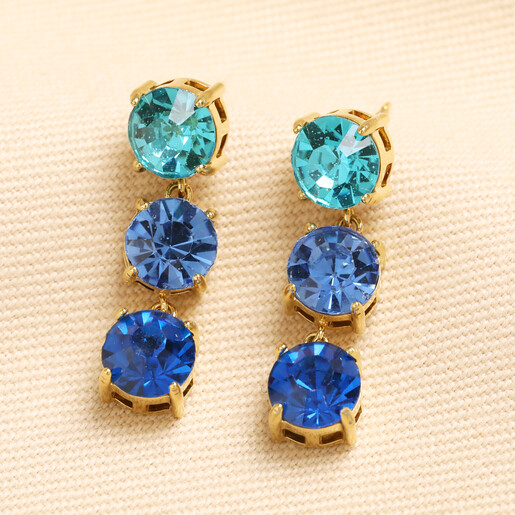 Pair of blue stainless steel graduated triple gem drop earrings