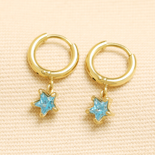 light blue huggie hoop star charm earrings