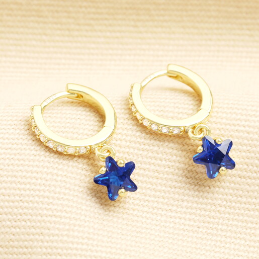huggie hoop earrings with blue crystal