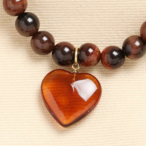 close up of amber heart pendant