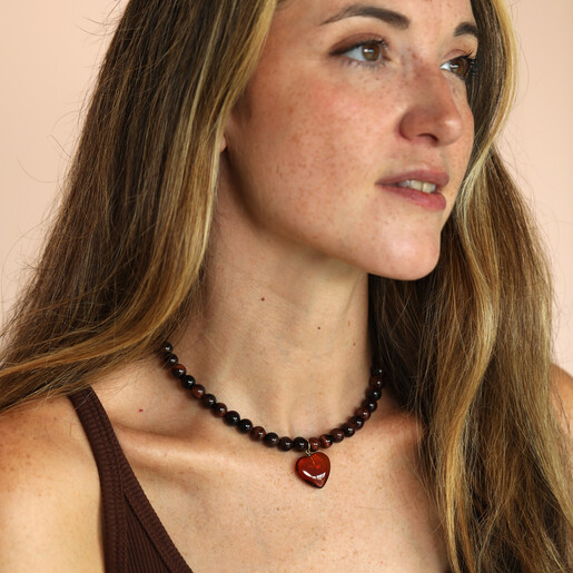 model shot of beaded necklace with amber heart pendant