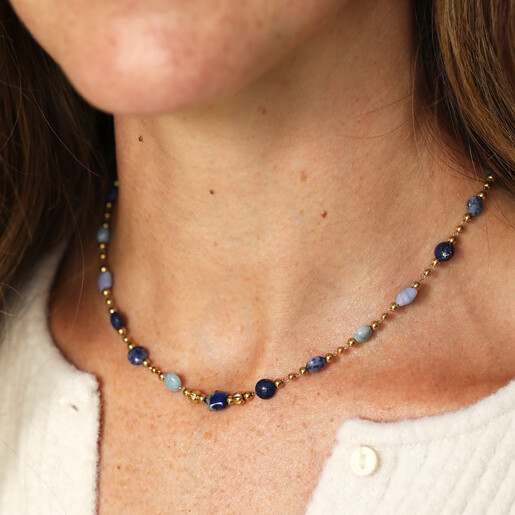 blue beaded necklace in silver on model