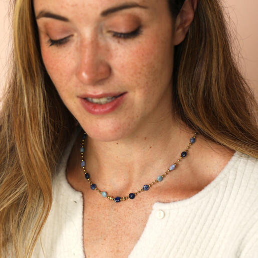 model shot of beaded necklace in blue with star charm