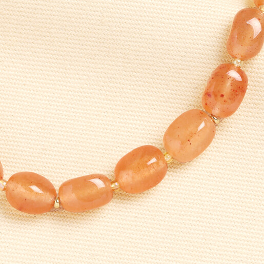 close up of orange beads