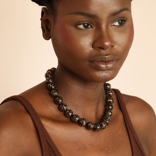 leopard print beaded necklace on model 