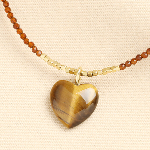 close up of tiger's eye pendant 
