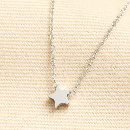 Silver stainless steel star pendant necklace on a fine trace chain