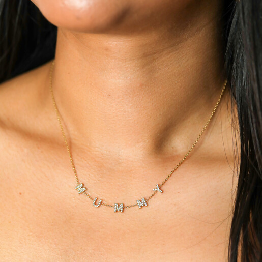 model shot of sparkly mummy charm necklace