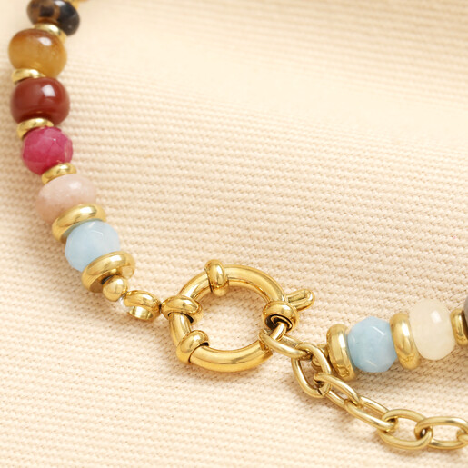 Close up of gold stainless steel spring ring clasp and extender chain