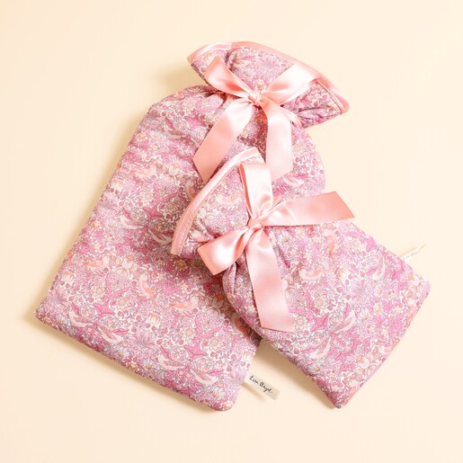 Two sizes of pink Strawberry Thief Liberty print hot water bottles together