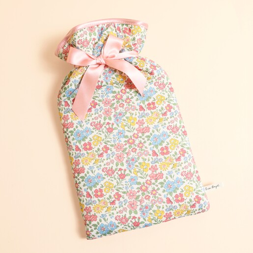 Large Annabella floral Liberty print hot water bottle with pink satin ribbon bow