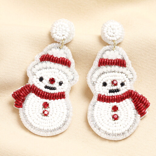 A Pair of White Beaded Snowman Shaped Earrings with Red Embroidered Details