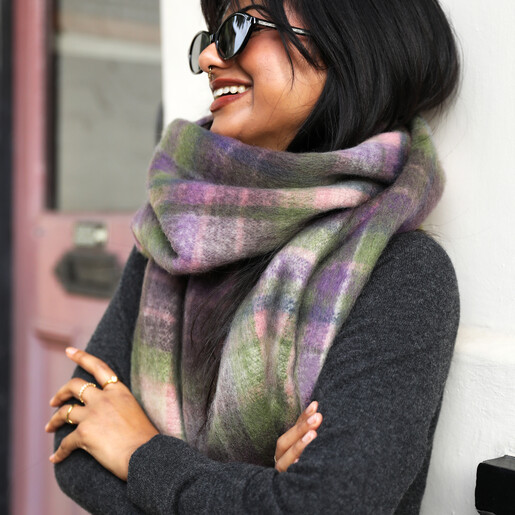 model with sunglasses and scarf