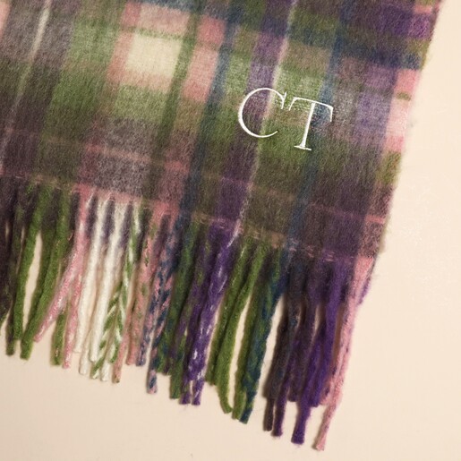 Personalised purple and green tartan winter scarf with white embroidered initials
