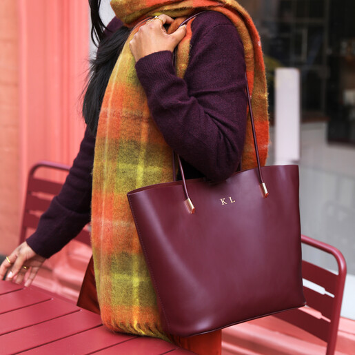 model shot of red tote bag