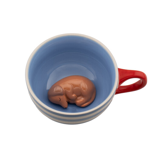 Inside view of the ceramic mug featuring a 3D sleeping sausage dog figurine