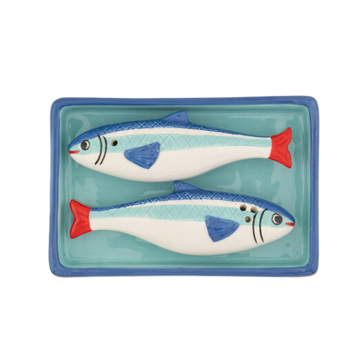 Top view of ceramic sardine shakers resting in sardine tin tray