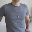 Men's Silver Spinning Ring Necklace on Model
