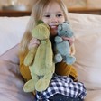 Lisa Angel with Jellycat Bashful Dino Soft Toy and Dragon Soft Toy