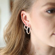 Lisa Angel Ladies' Hammered Silver Hoop Earrings on Model