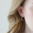 Small Teardrop Hoop Earrings in Silver on Model
