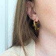Gold Tortoiseshell Disc Hoop Earrings on Model