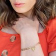 Model Wearing Lisa Angel Ladies' Heart Lock and Chain Bracelet in Gold