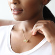 Gold Sloth Pendant Necklace on Model