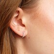 Sterling Silver Crystal Huggie Hoop Earrings on Model
