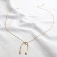 Lisa Angel Long Gold Hug Hands Pendant Necklace