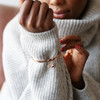 'Nana' Meaningful Word Bangle in Rose Gold on Model