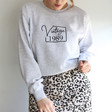 Personalised 'Vintage Year' Unisex Sweatshirt in Grey on Female Model