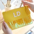 Personalised Block Initials Iridescent Tassel Make up Bag in Mustard Yellow