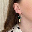 Turquoise Bead and Shell Hoop Earrings on Model