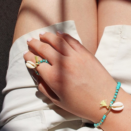 Girls Turquoise Beaded Stretch Ring with Shell Charm on Model