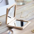 Inside of Personalised 'Never Stop Looking Up' Sun and Moon Compact Mirror