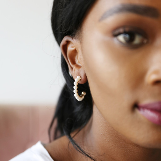 Gold Pearl Hoop Earrings on Model