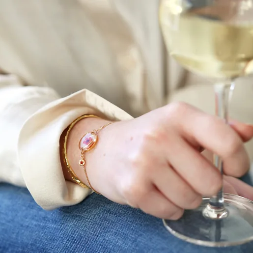 Model Wearing Lisa Angel Ladies' Gold Pressed Birth Flower Charm Bracelet with Birthstone Charm