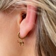 Model Wears Lisa Angel Elephant Huggie Hoop Earrings in Gold