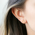 Mismatched Heart Stud Earrings in Gold on Model
