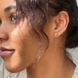Lisa Angel Mismatched Moon Earrings in Gold on Model