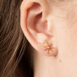 Lisa Angel Ladies' Mismatched Star and Moon Stud Earrings in Gold on Model