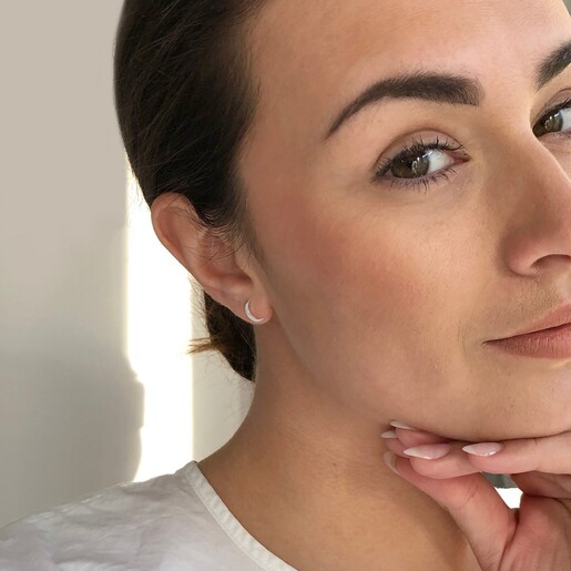 Model Wearing Lisa Angel Ladies' Moon and Sun Stud Earrings in Silver