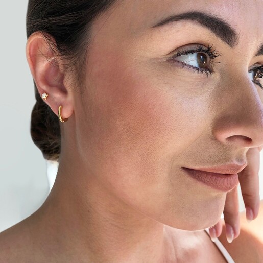 Model Wears Set of Four Gold Opal Earrings