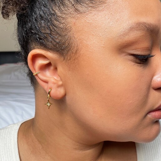 Shooting Star Huggie Hoops in Gold From Lisa Angel on Model