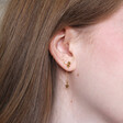 Model Wearing Lisa Angel Ladies' Star Cluster Stud and Chain Drop Earrings in Gold