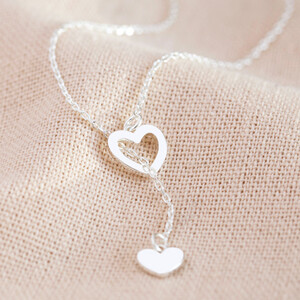 Mismatched Heart Laryat necklace in Silver
