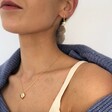 Lisa Angel Ladies' Delicate Birthstone Heart Locket Necklace in Gold on Model